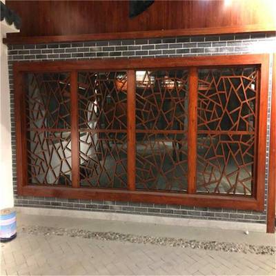 乡村沿街立面改造中的仿古木纹铝窗花 专业厂家的优势与特色